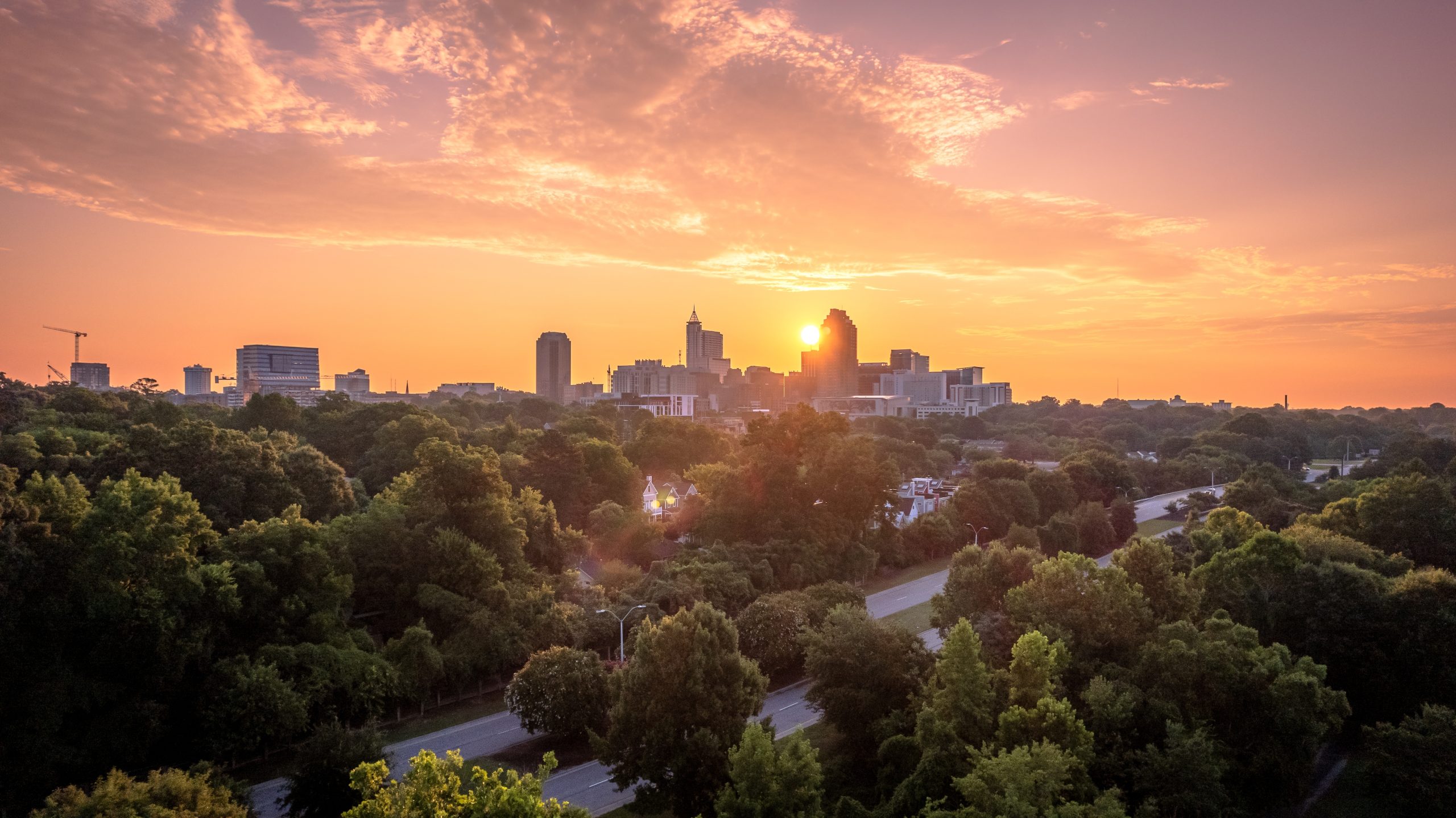 Raleigh, North Carolina skyline at sunset.