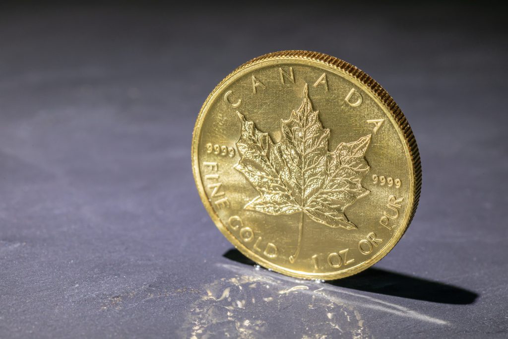 A Canada Gold Maple Leaf coin.