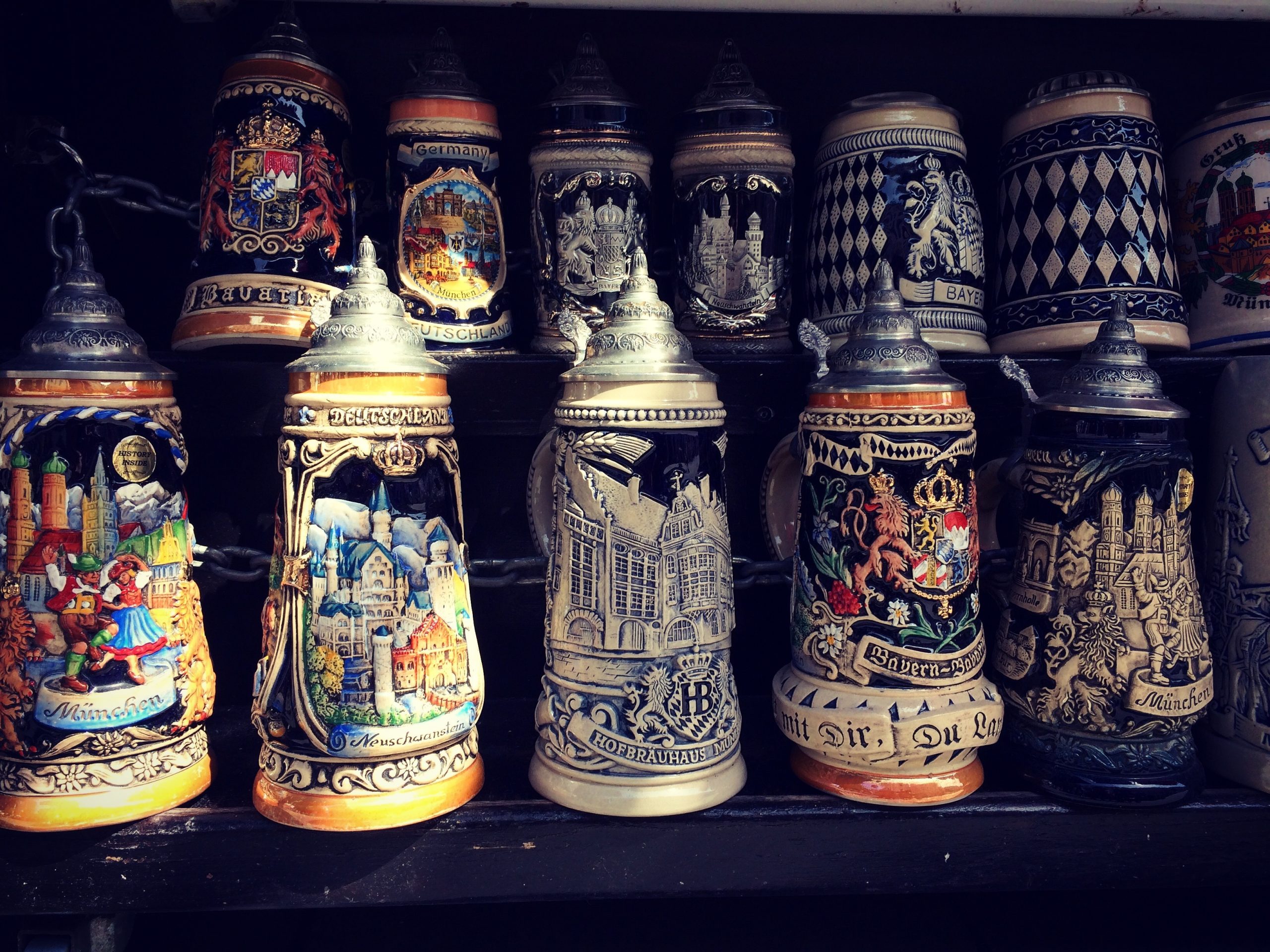 Two rows of traditional beer stein.